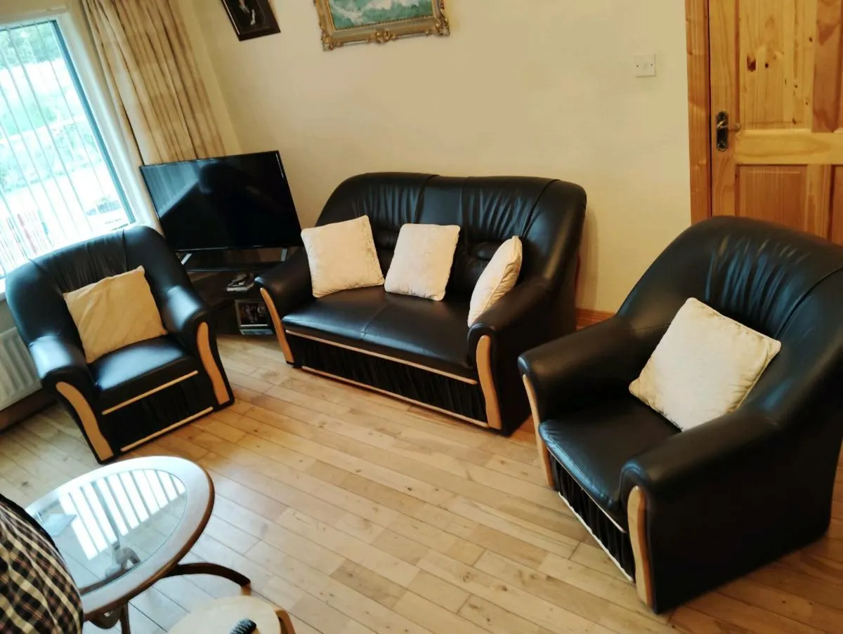 Black Leatherette 2 Piece Couch and Armchairs - Image 1