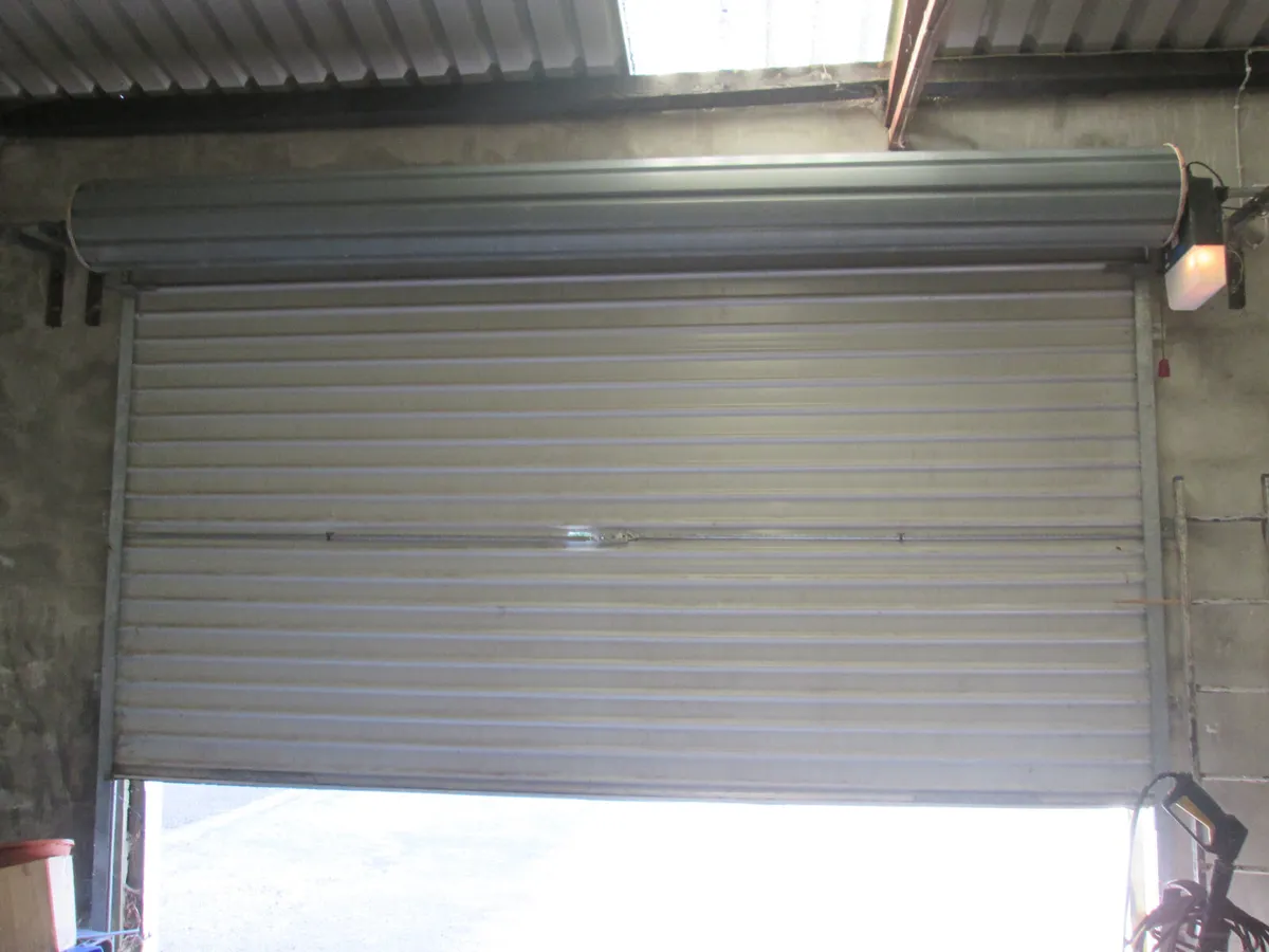 12 X 9 FT.  REMOTE ELECTRIC GARAGE DOOR - Image 4