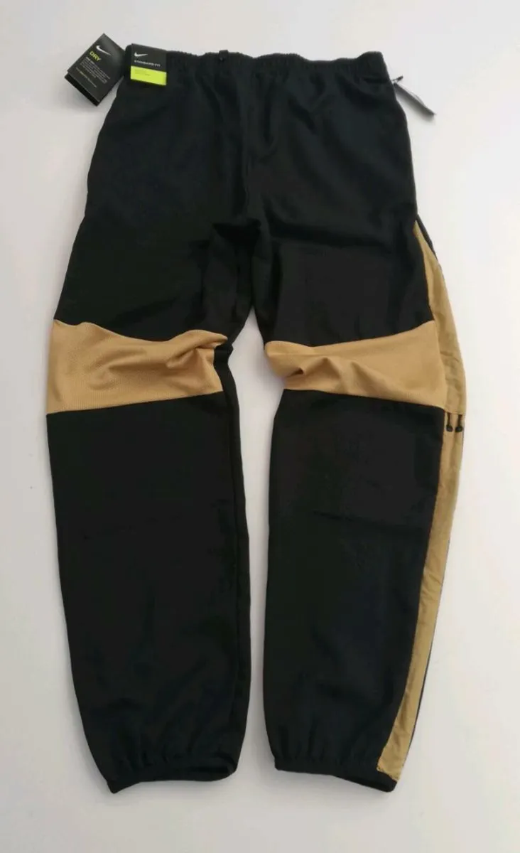 Nike New dri fit track bottoms adjustable leg - Image 1