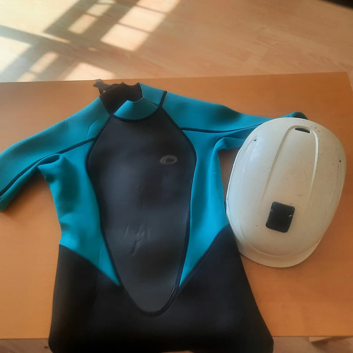 Typhoon Wetsuit and Sweet Protection kayak helmet - Image 1