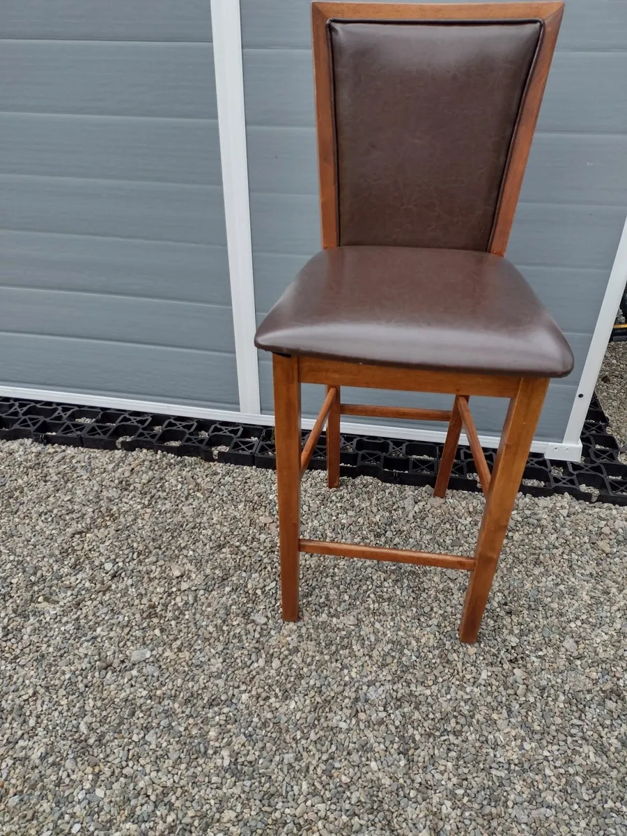 Walnut kitchen bar stool with brown leather seat. - Image 1