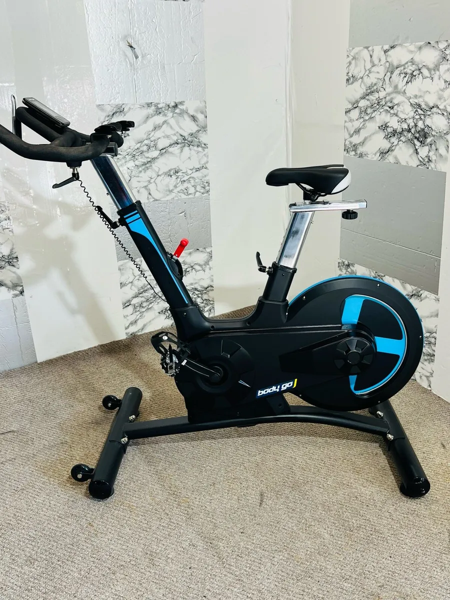 LARGE EXERCISE SPIN BIKE 20KG WHEEL GREAT CONDTION - Image 1