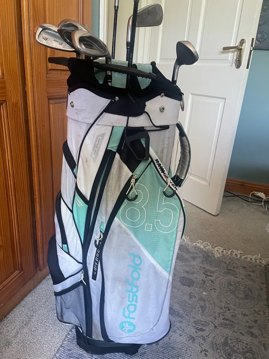 Golf bag and clubs - Image 1
