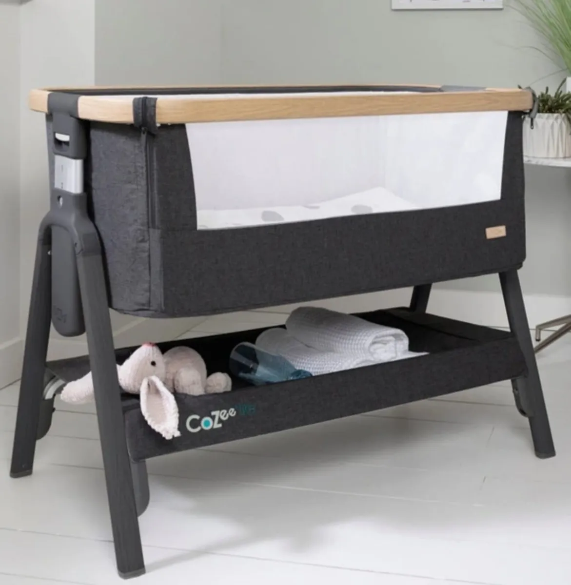 Tutti bambini CoZee Lite beside crib - Image 1