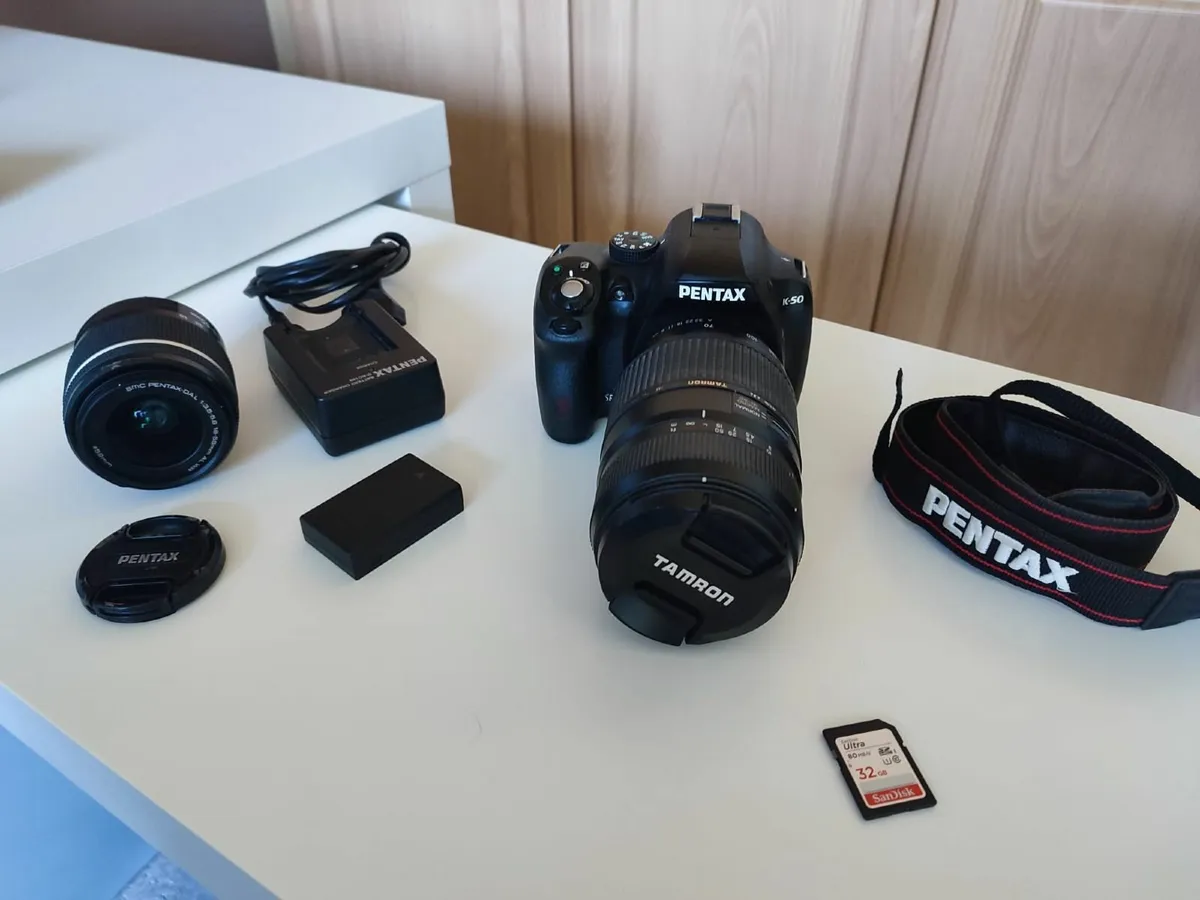 Pentax K-50 DSLR + lenses + SD card - Image 1