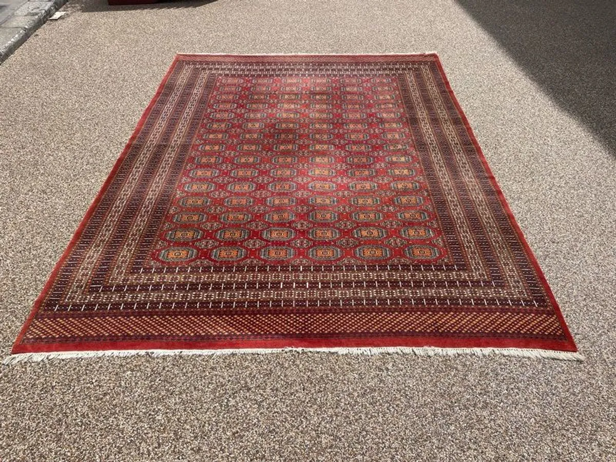Beautiful Vintage Hand-knotted Pakistani Bokhara Rug - Image 1
