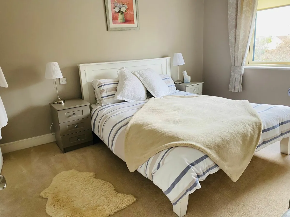 King size wooden bed including mattress