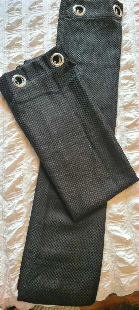 Beautiful pairs of never-before-used black curtain