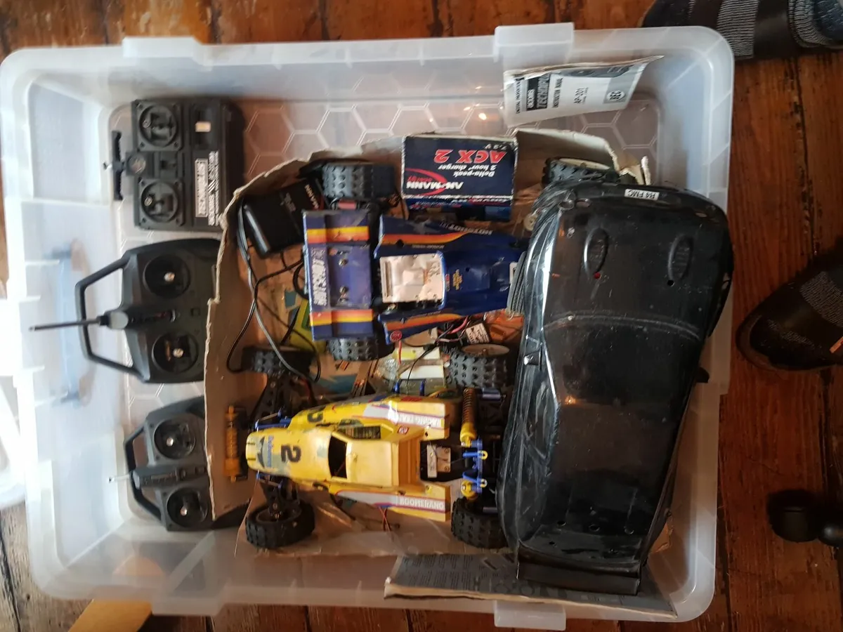 3x remote control Tamiya cars with controllers - Image 1