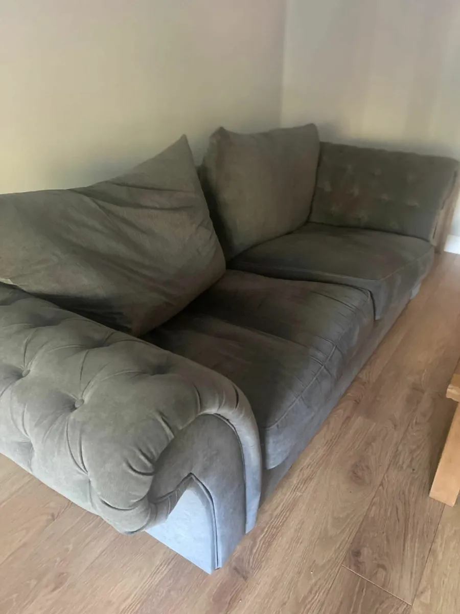 Grey Three Seater Sofa and Large Arm chair - Image 1