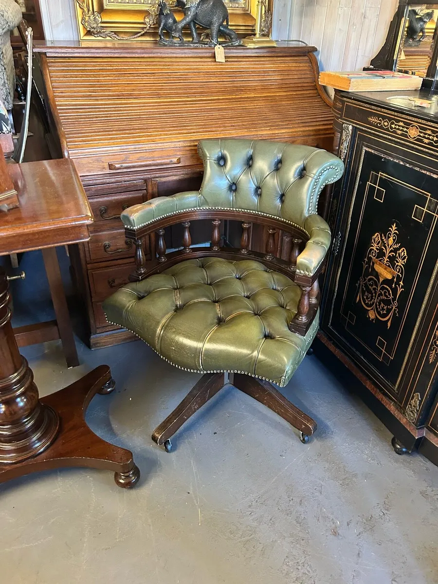 Green leather captain’s chair