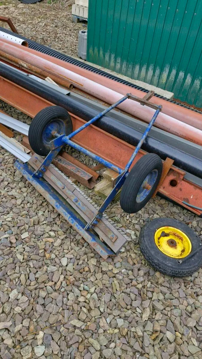 Yard scraper and brush