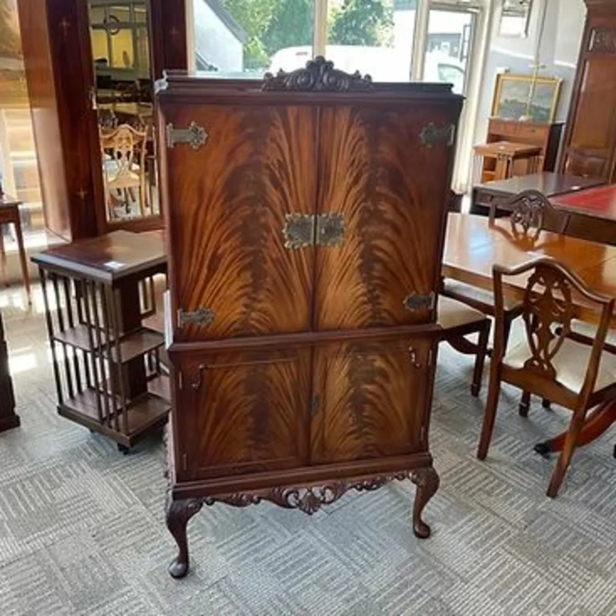 Mid 20th century mahogany flamed drinks cabinet