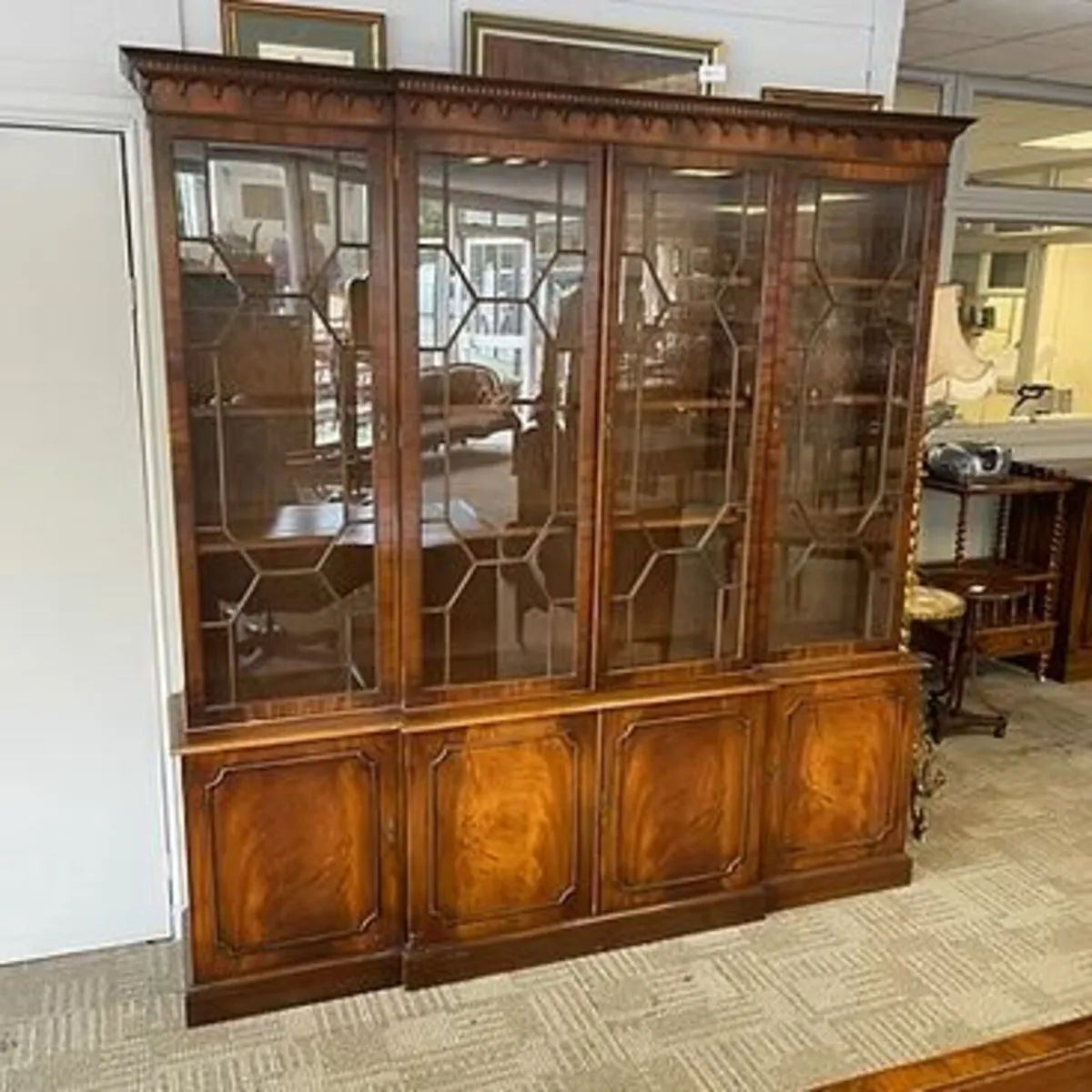 Bevan Funnell mahogany flamed breakfront display c