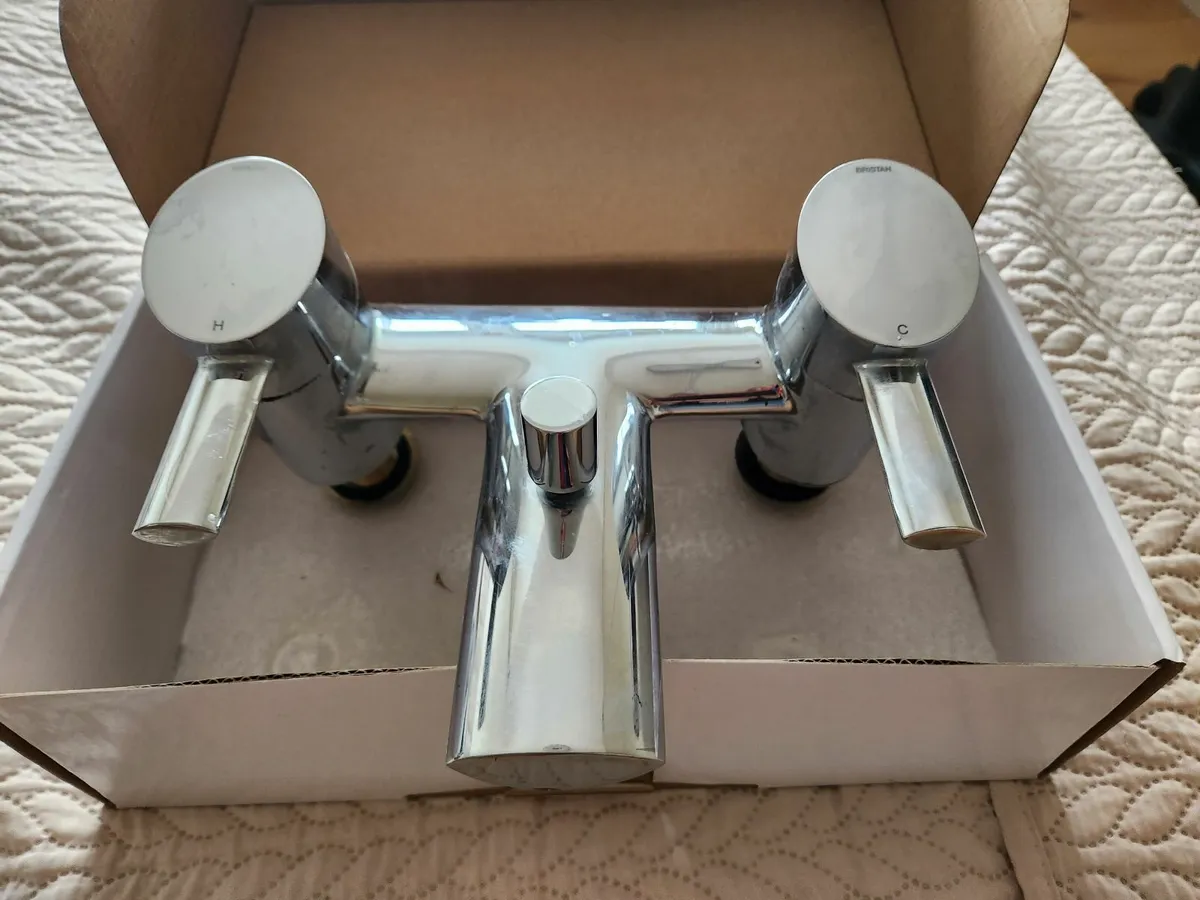 Bath mixer deck mounted