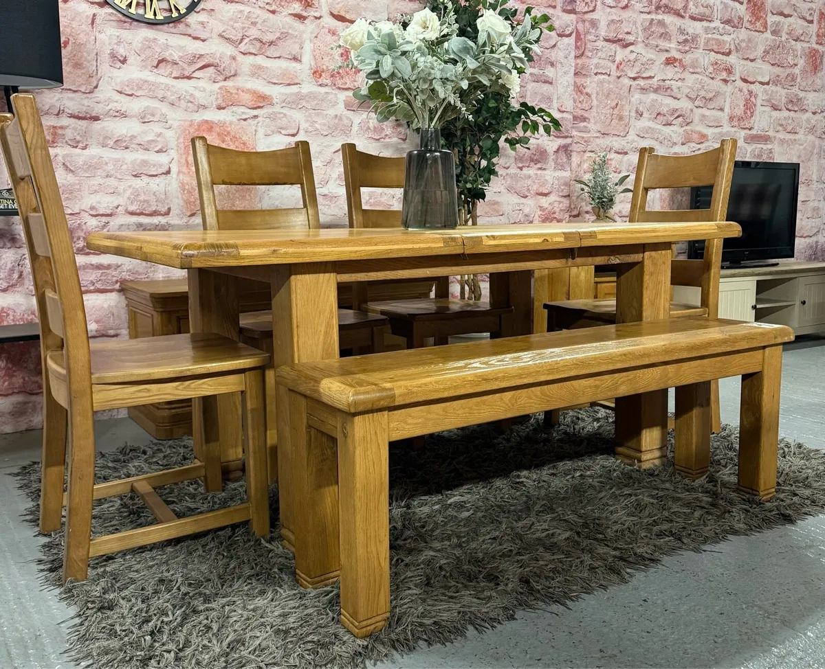 Extending oak kitchen table, 4 chairs & bench - Image 1