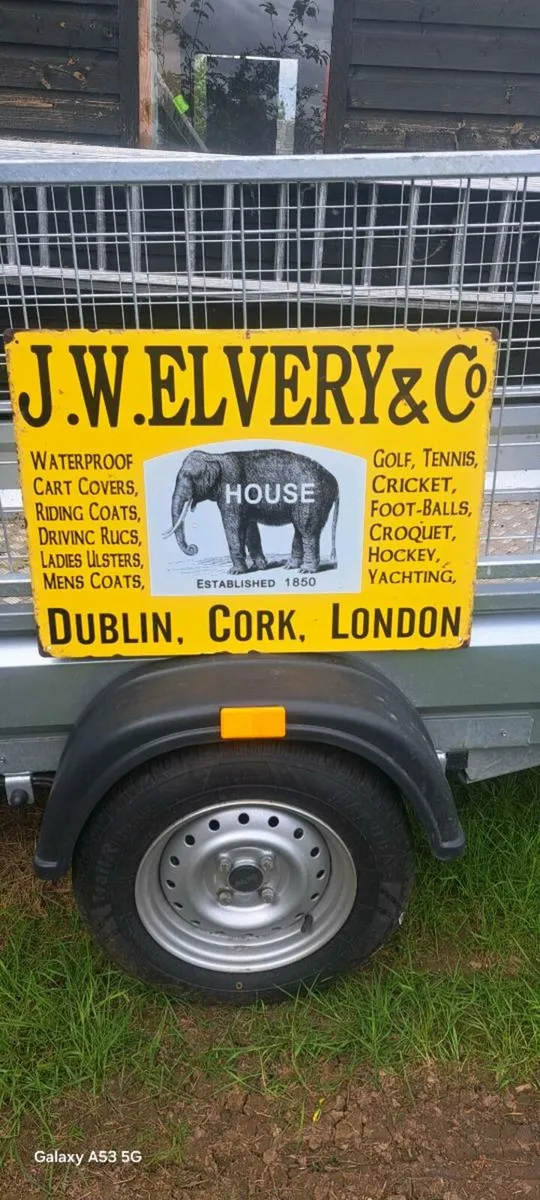Large  jw everly metal sign