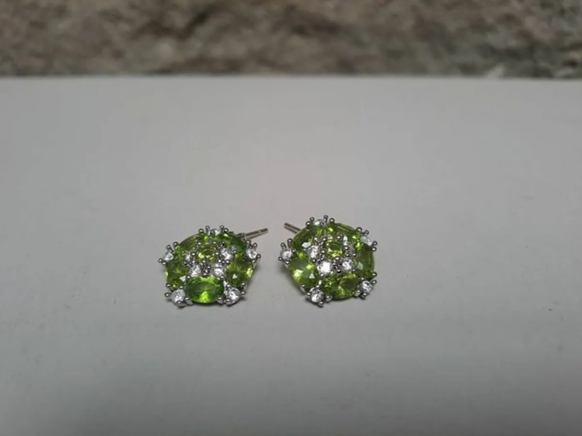 Sterling silver earrings with green peridot - Image 1