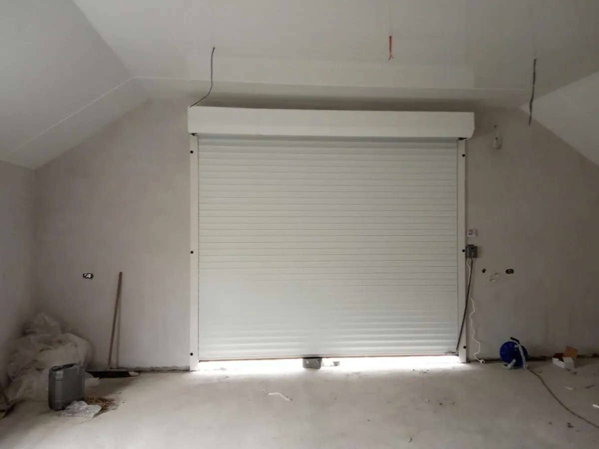 insulated  roller  door  black,  2.5 x 2.5 - Image 1