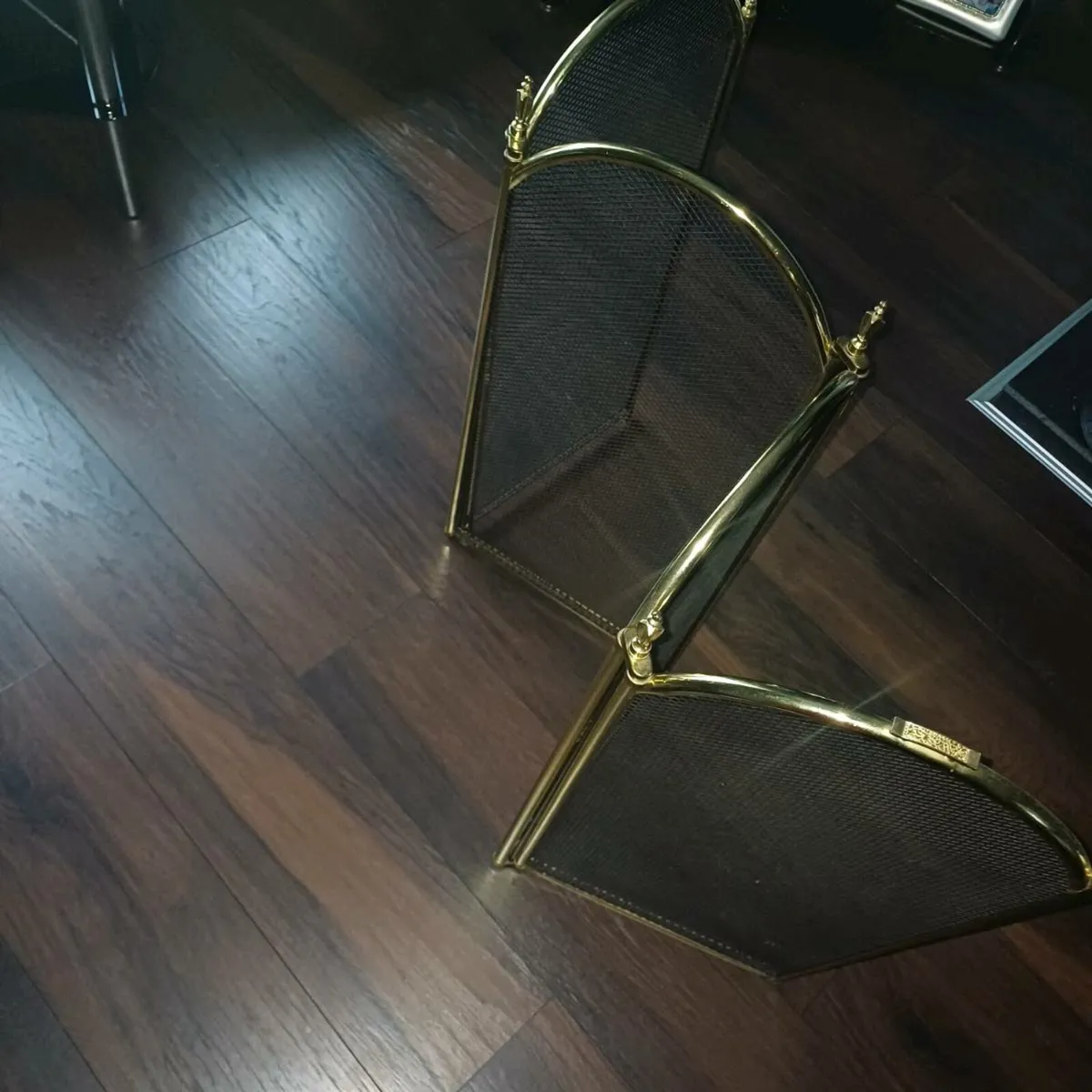 Black and brass fire screen Excellent condition