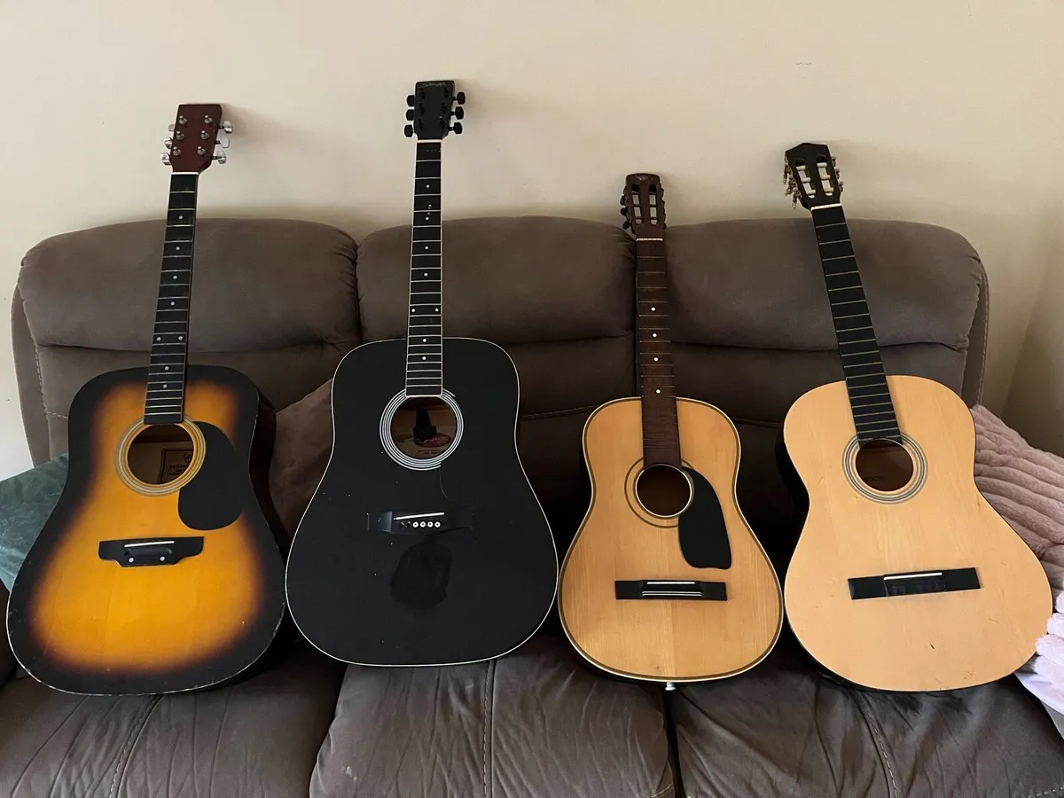 4 acoustic guitars - Image 1