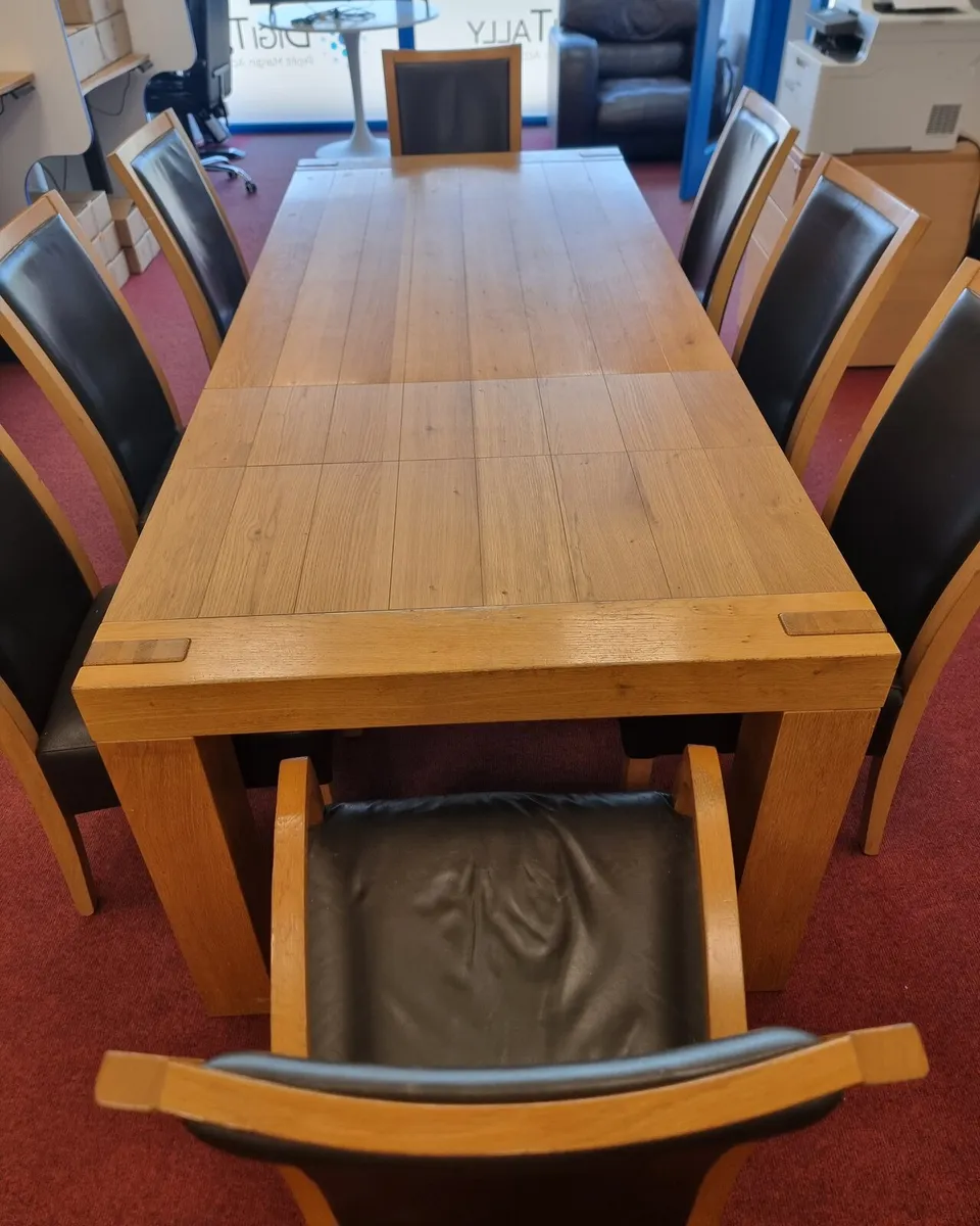 Kitchen table and 8 leather chairs - Image 2