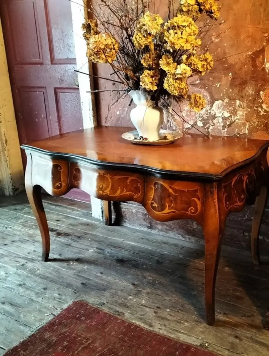 An inlaid shaped centre writing Table - Image 1