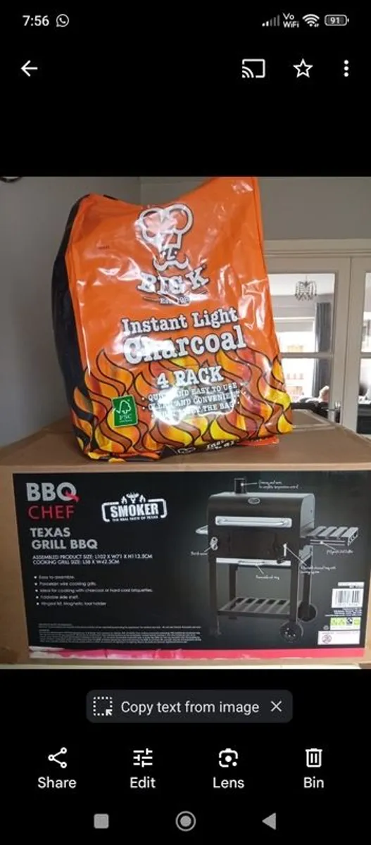 BBQ and bag of charcoal