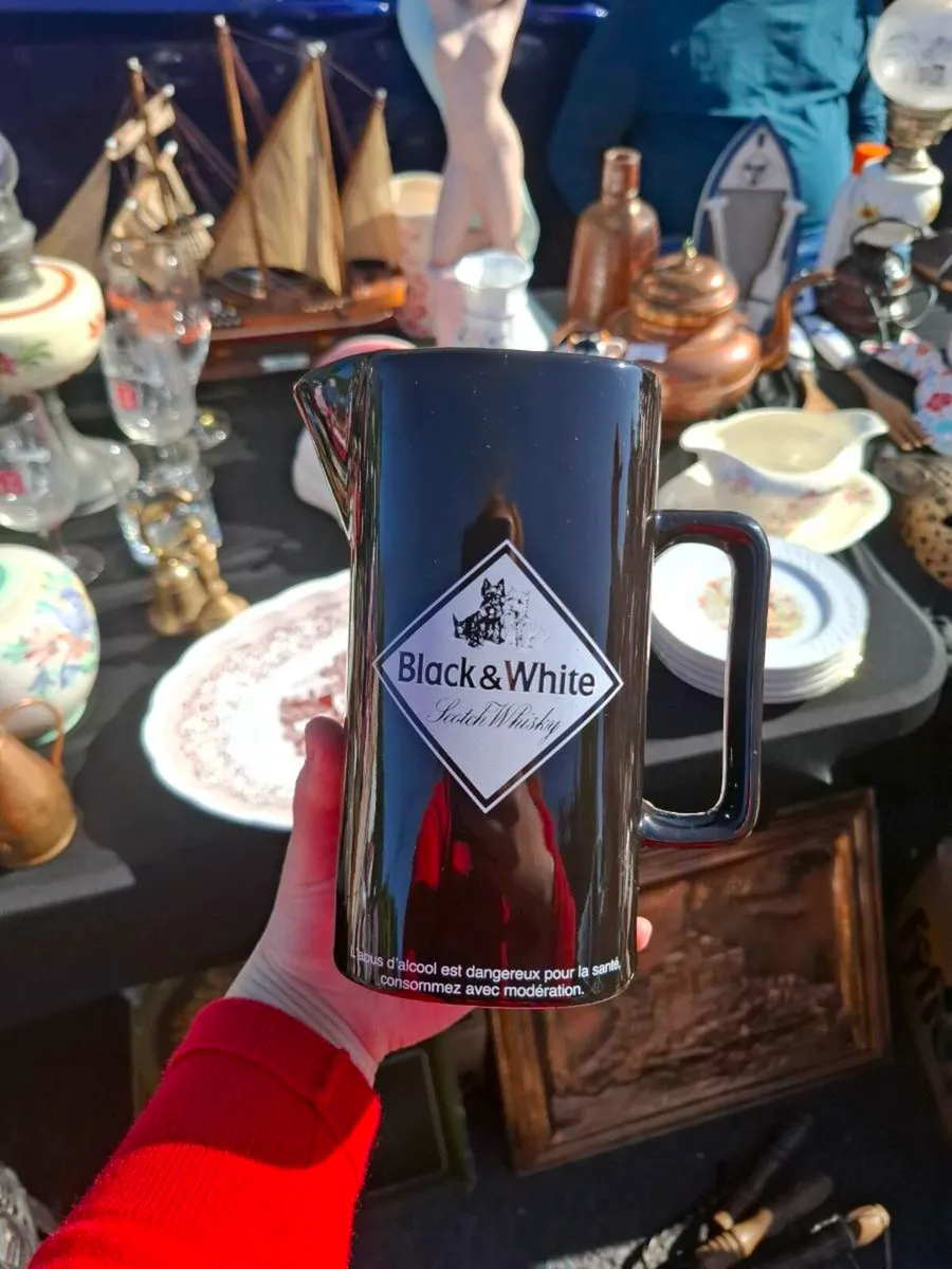 Black and white whiskey jug postage possible