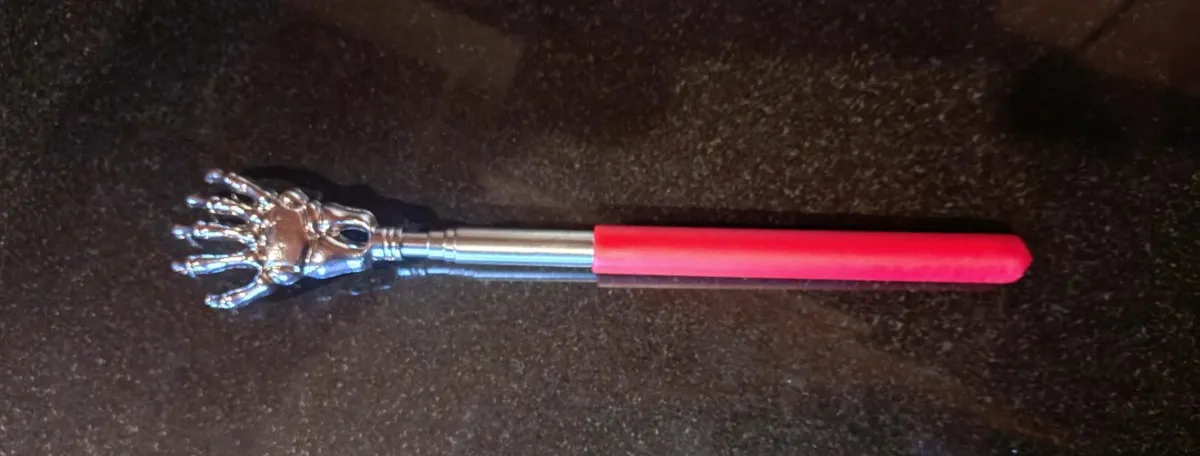 SKELETON HAND TELESCOPIC BACK SCRATCHER (NEW). - Image 1