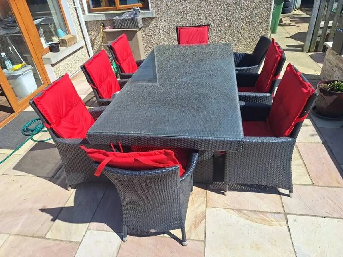 Rattan table and 8 chairs - Image 3