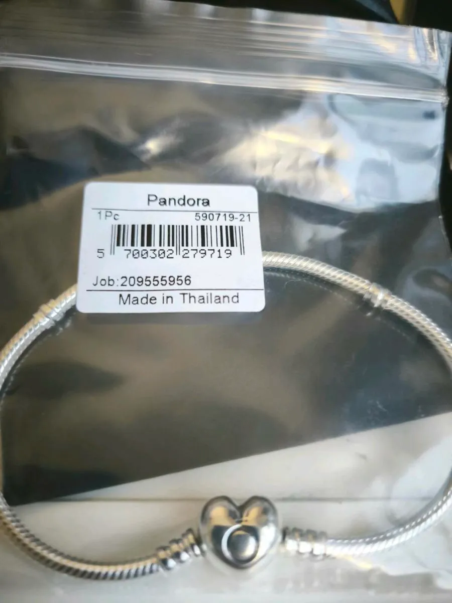 Pandora bracelet and charms - Image 1