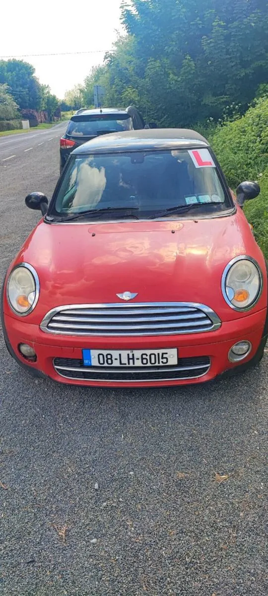 2008 Red mini cooper d - Image 1