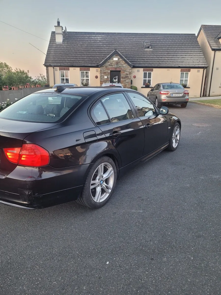 2012 BMW 3 series black - Image 3