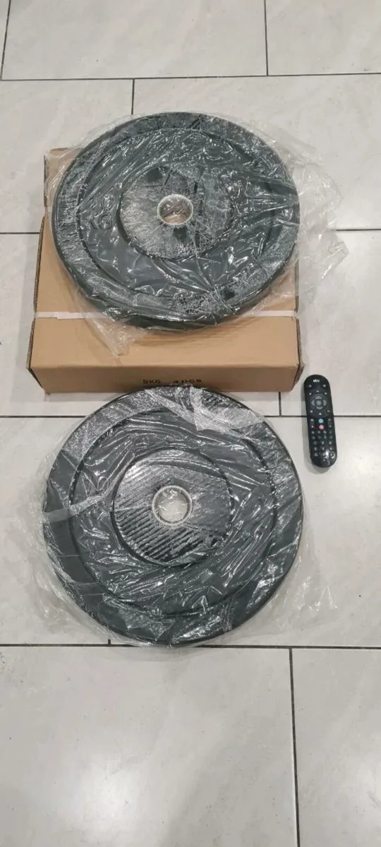 Brand new 2x10 kilo Olympic bumper weight plates