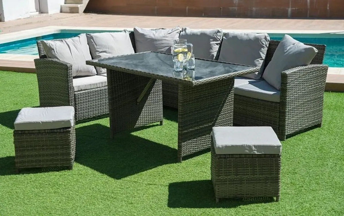 Grey corner sofa bed+table+ 2 Rattan puff. - Image 1