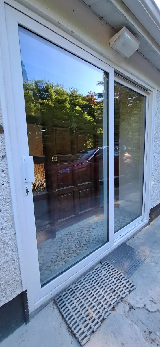 Sliding porch doors - Image 1