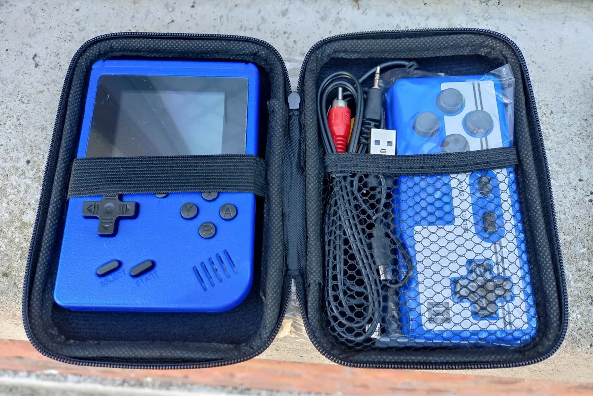 VIDEO GAME CONSOLES WITH CASE & CONTROLLER (NEW). - Image 1
