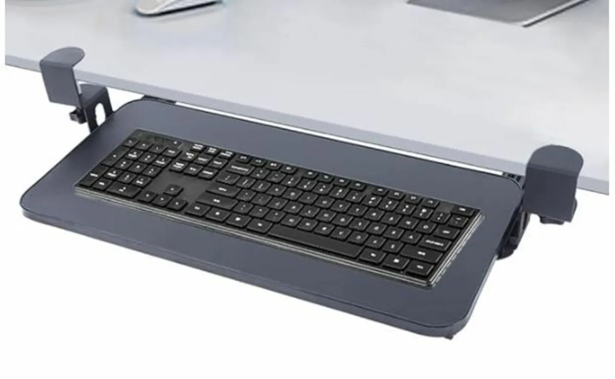 Keyboard tray with clamps