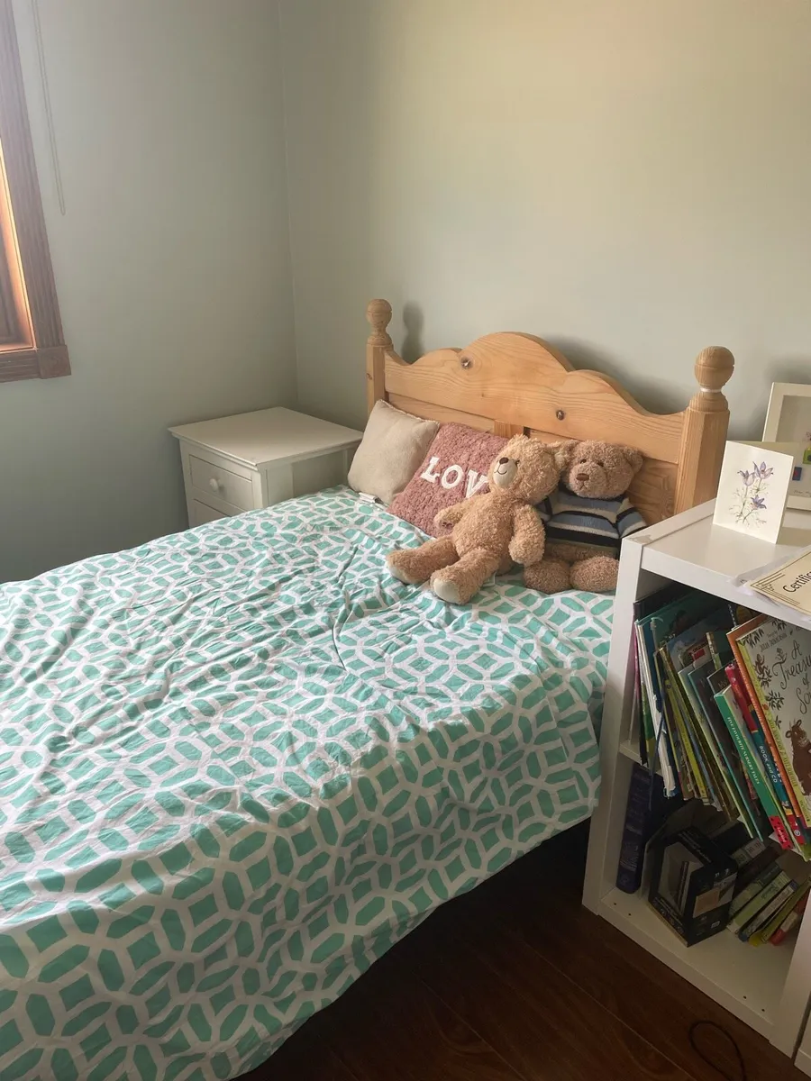 Two single wooden bed frames - Image 1