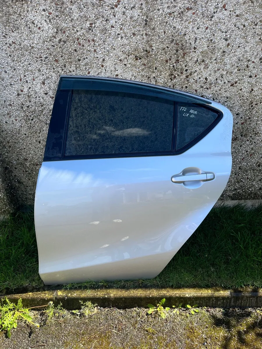 Toyota Aqua Silver Left Rear door - Image 1