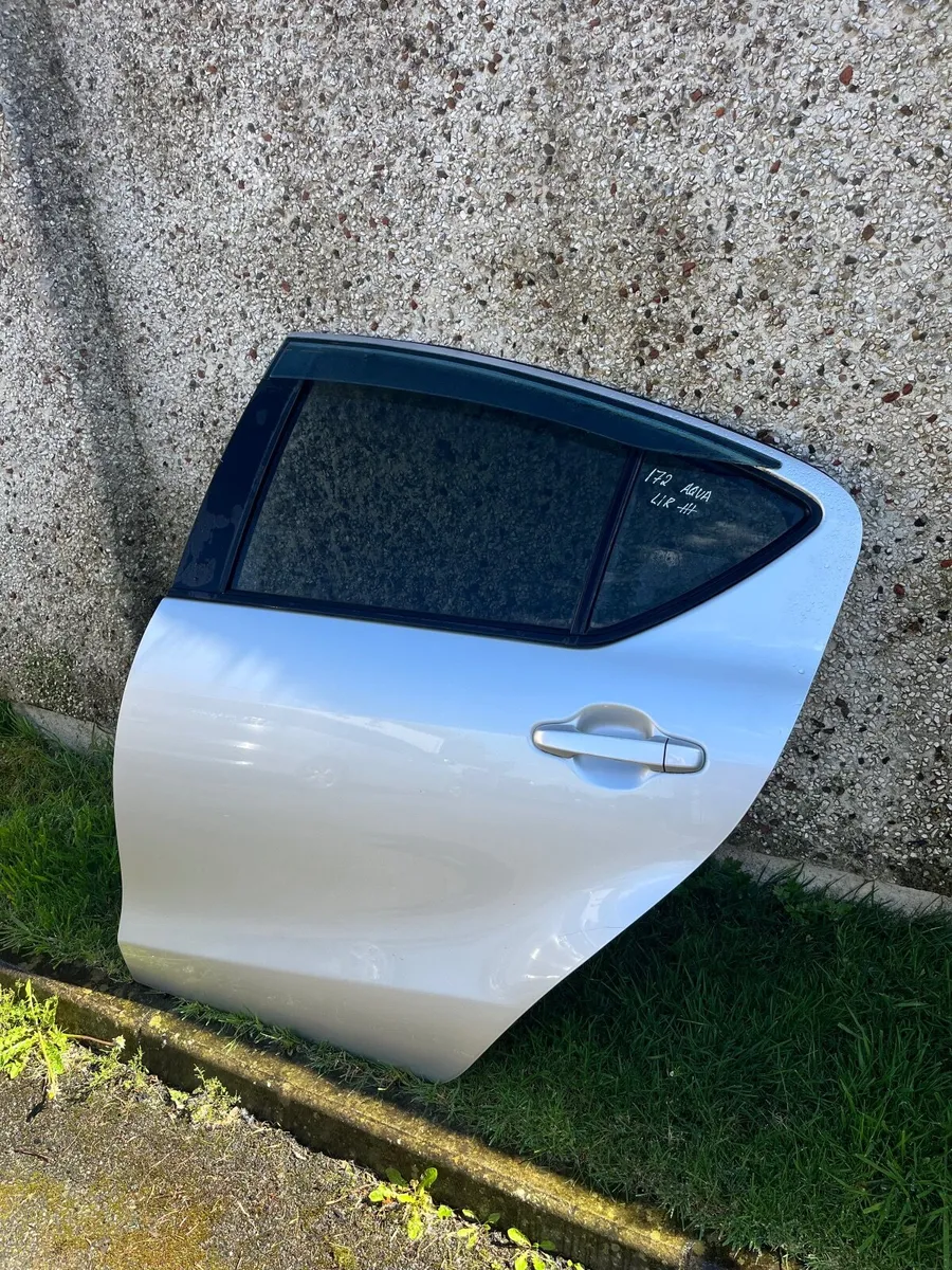 Toyota Aqua Silver Left Rear door - Image 2