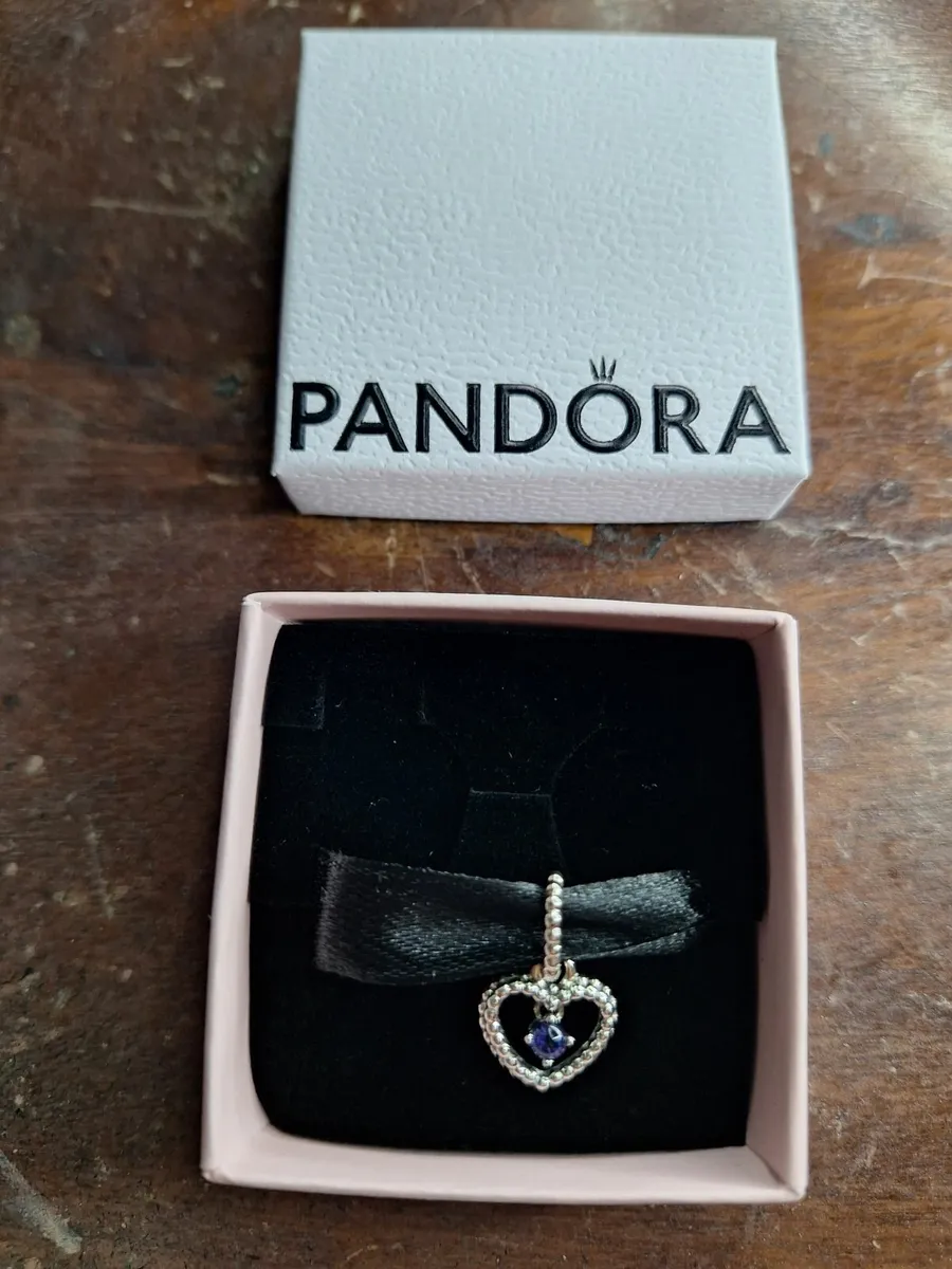 NEW Pandora charm with February birthstone - Image 1