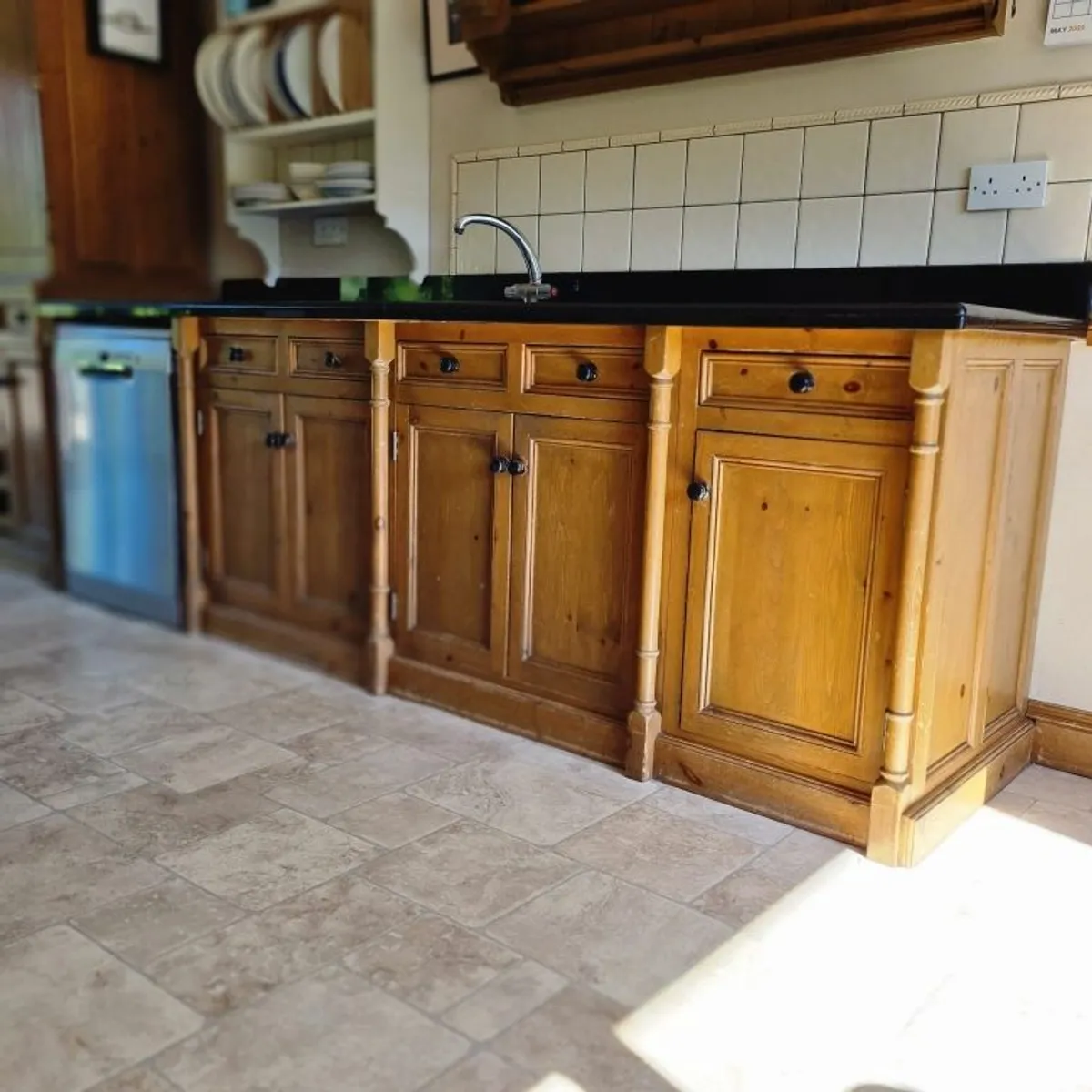 Black solid granite work top and kitchen cabinets - Image 1