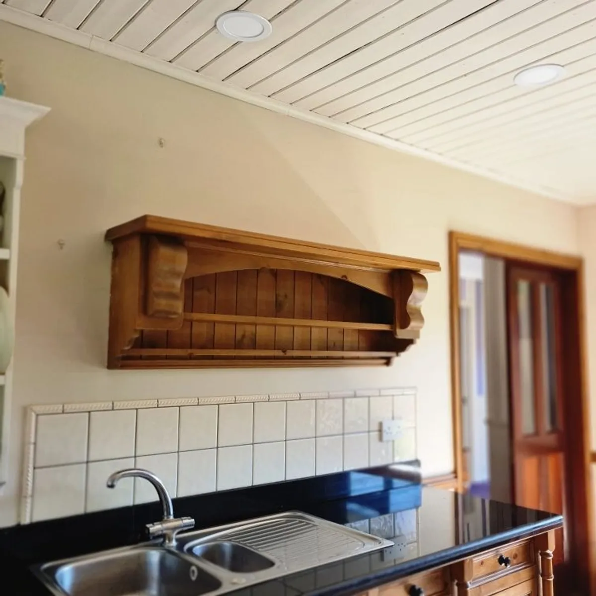 Black solid granite work top and kitchen cabinets - Image 4