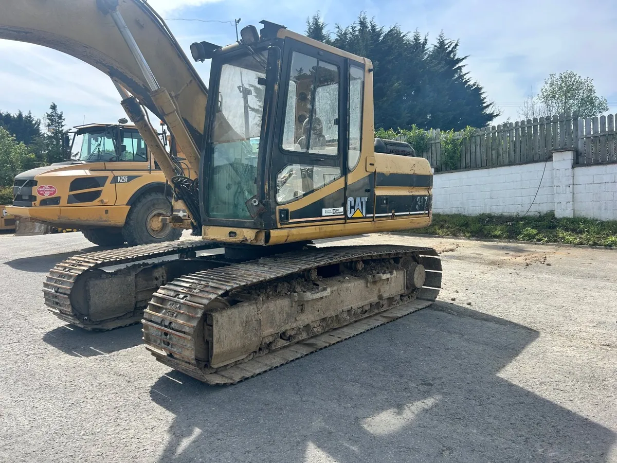 Caterpillar 317 - Image 1