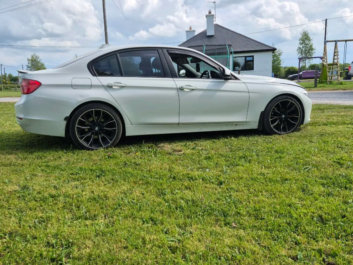 White BMW 320d - Image 1