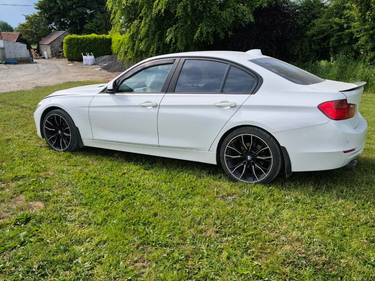White BMW 320d - Image 3
