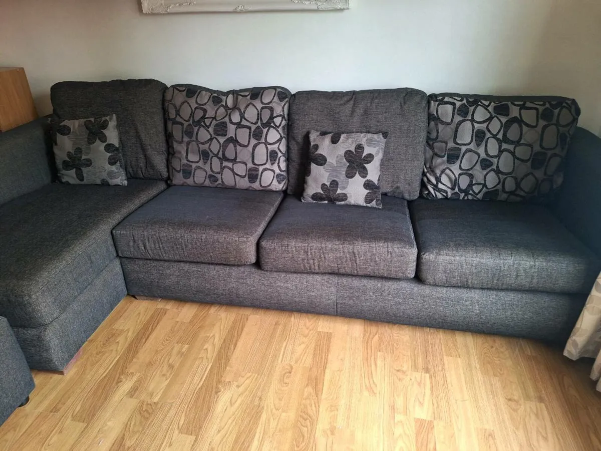 Corner sofa and storage ottoman - Image 1