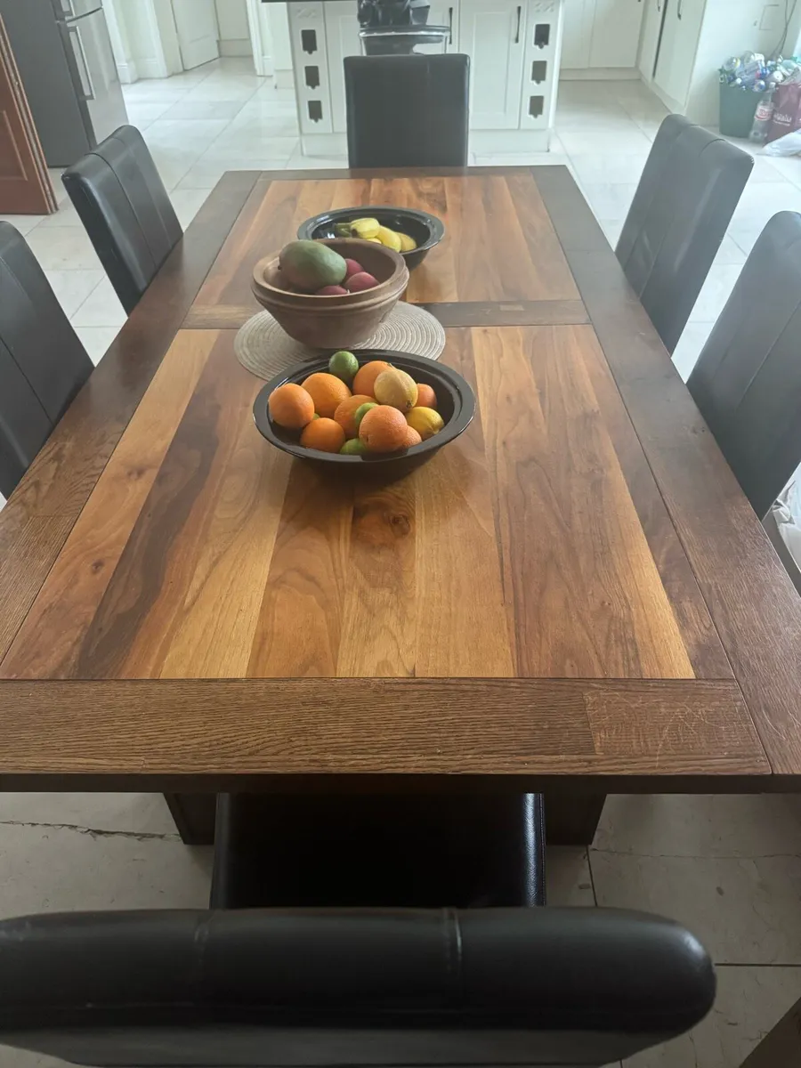 Solid wood table and six chairs - Image 1